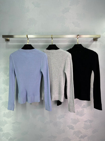 Ribbed High-Neck Wool Sweater